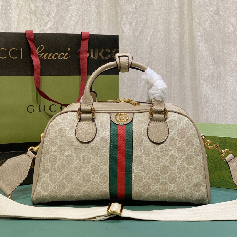 G*u*i top handle bags